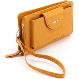 Karya Шкіряний жіночий гаманець-клатч оранжевого кольору з кистьовим ремінцем  67503