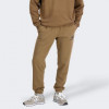 New Balance Коричневі чоловічі спортивнi штани  Essentials Stacked Logo Fleece Pant nblMP31539DHE - зображення 1