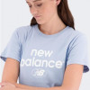 New Balance Блакитна жіноча футболка  Essentials Reim. Arch. Jersey nblWT31507LAY - зображення 5