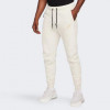 Nike Молочні чоловічі спортивнi штани  M NK TCH FLEECE JGGR FZ4710-104 - зображення 1