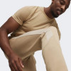PUMA Бежеві чоловічі спортивнi штани  EVOSTRIPE Pants DK 678997/83 - зображення 4