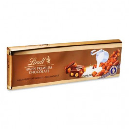   Lindt Шоколад молочний  Gold з фундуком, 300 г (7610400013864)