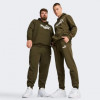 PUMA Оливкові чоловічі спортивнi штани  ESS Logo Pants FL cl (s) 586715/08 L оливковий - зображення 3