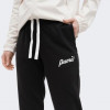 PUMA Чорні жіночі спортивнi штани  ESS+ BLOSSOM Script Pants TR 679350/01 - зображення 4