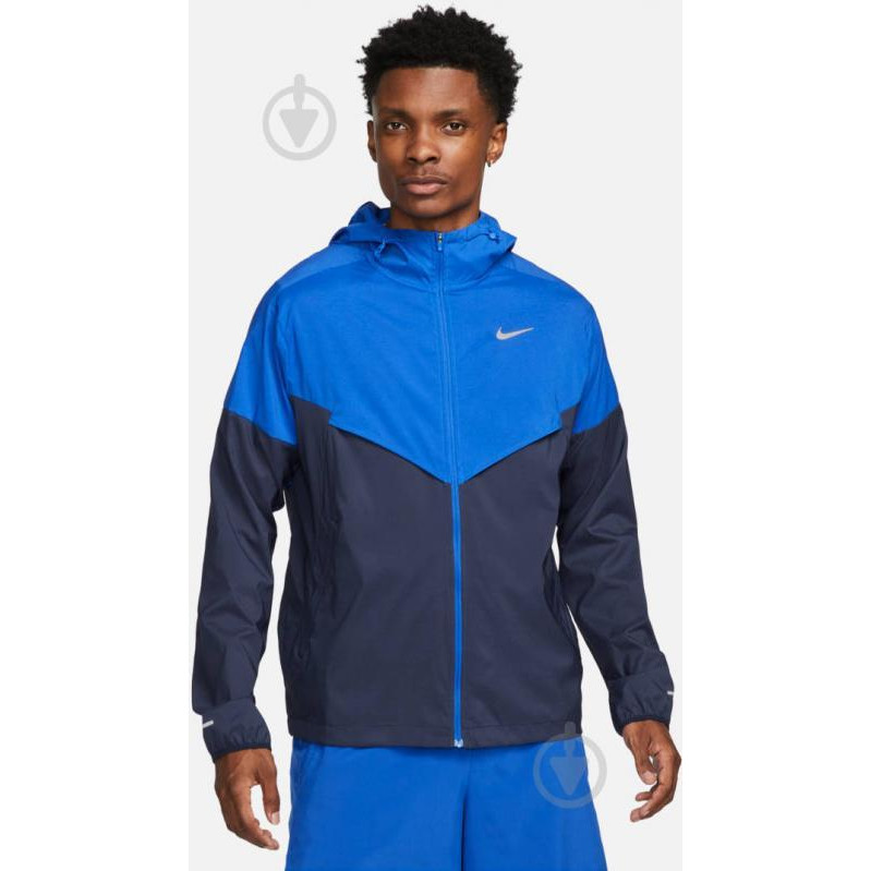 Nike Вітровка чоловіча  M Nk Imp Lght Windrnner Jkt FB7540-480 S Синя (196608721086) - зображення 1