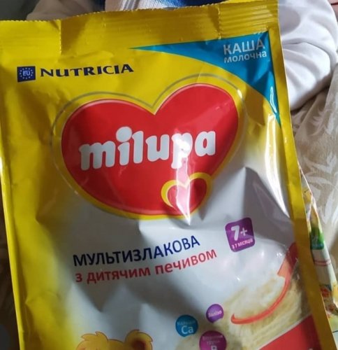 Фото Каша молочна Milupa Каша молочная мультизлаковая с детским печеньем 210 гр від користувача Malinka11