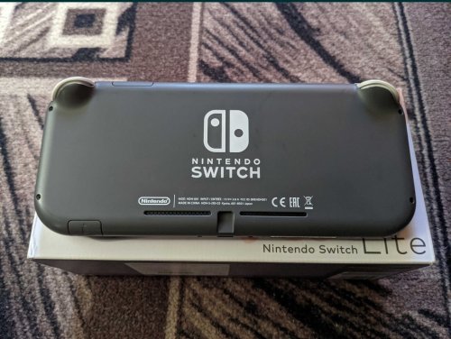 Фото Портативна ігрова приставка Nintendo Switch Lite Grey (045496452650) від користувача Славик Нестеренко