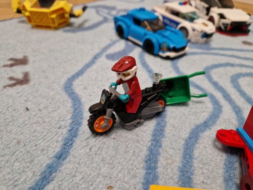 Фото Блоковий конструктор LEGO City Акробатический трюковый мотоцикл (60296) від користувача 2364275